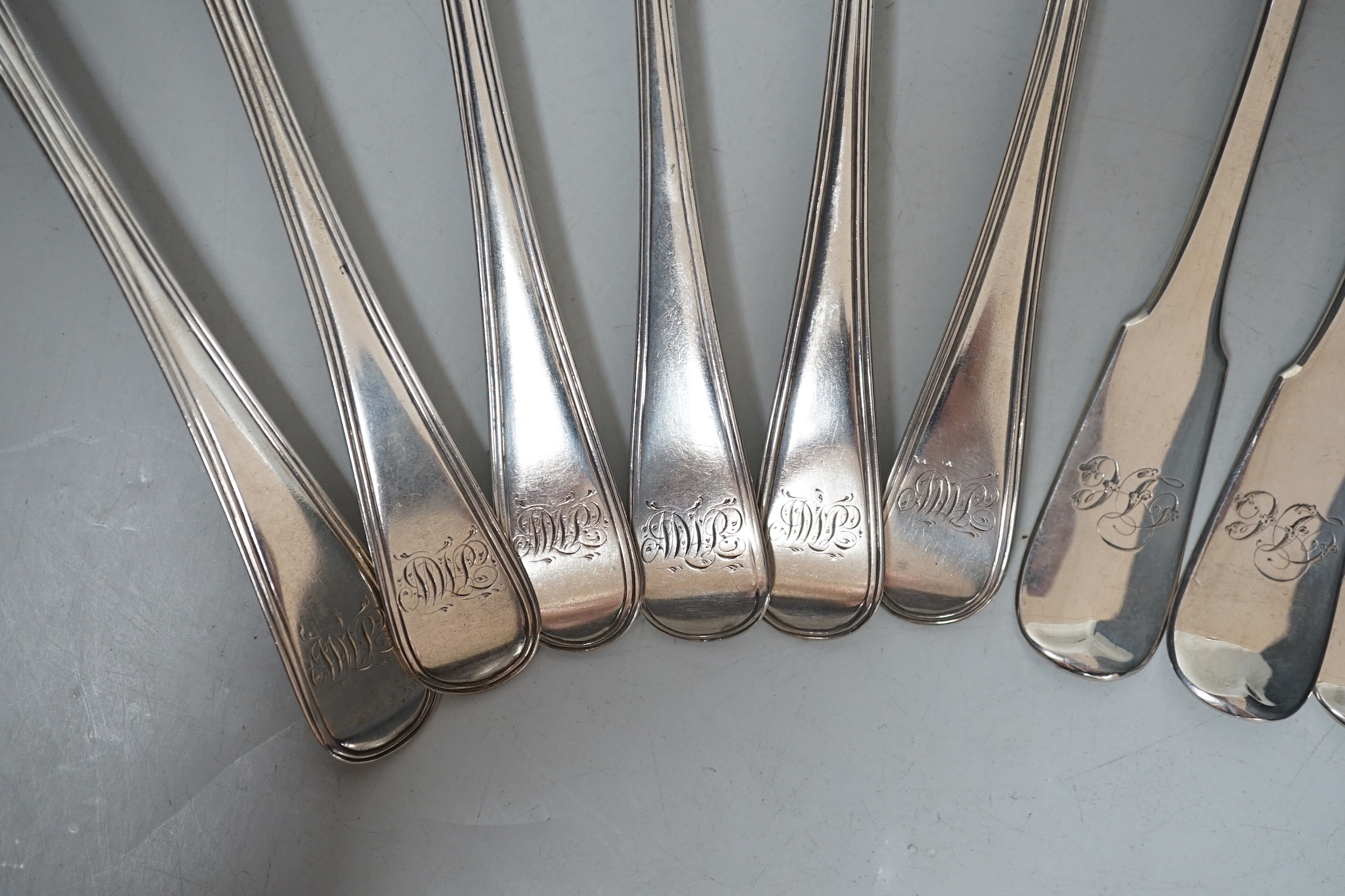 A harlequin set of six Georgian Scottish silver fiddle pattern table forks and a similar harlequin set of six Old English fiddle pattern table spoons, 24.1oz.